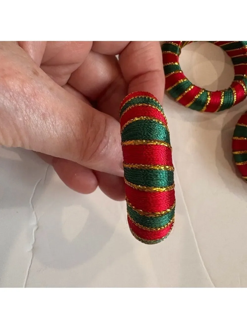 Festive Red and Green Striped Napkin Rings with metallic gold thread. Set of 12.